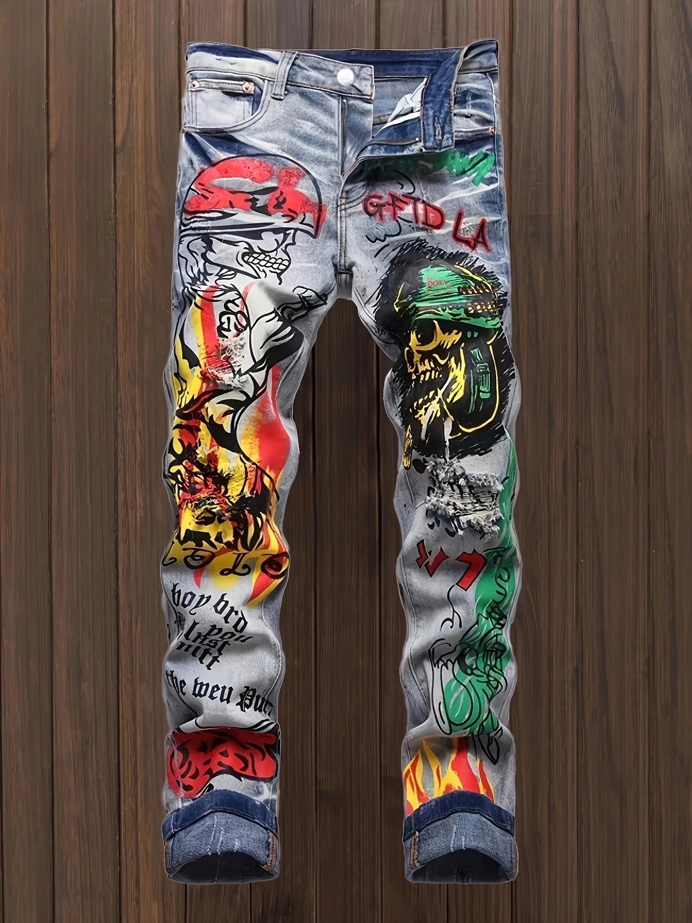 printed graffiti old washed and ripped jeans